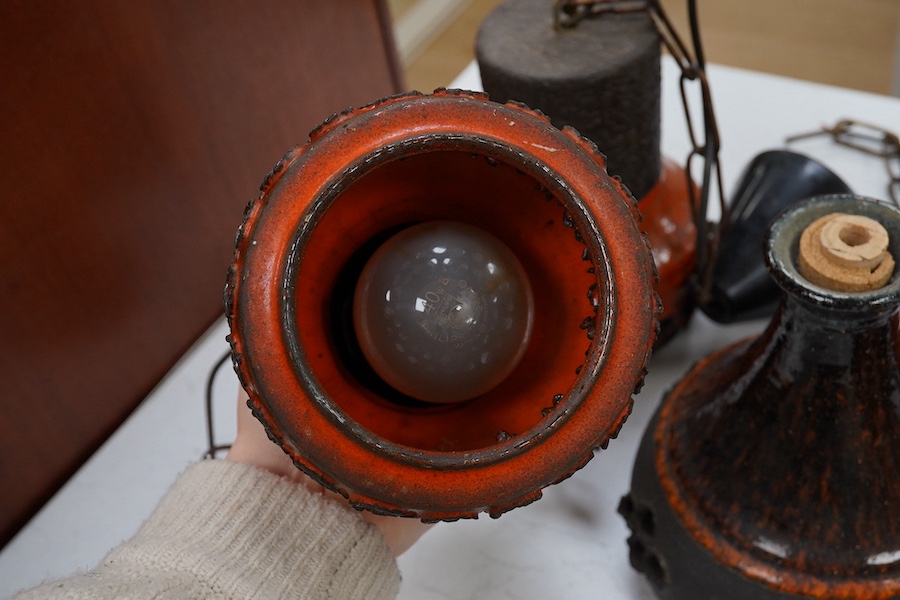 A set of three 1970s Danish pottery brown and orange glazed pendant lights and two other larger similar pottery lights, 19cm high (5). Condition - good